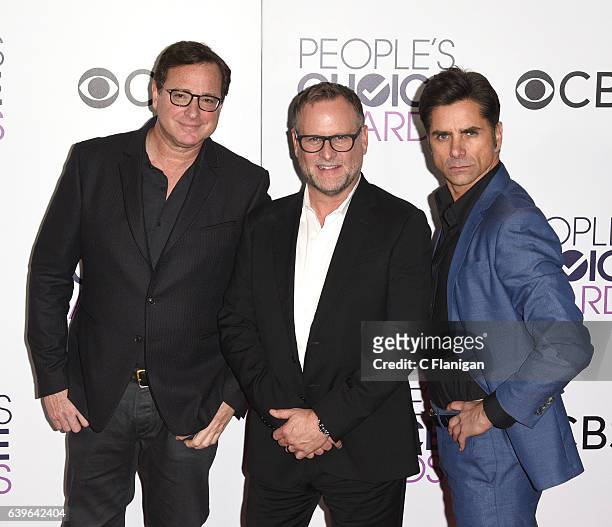 Actors Bob Saget, Dave Coulier and John Stamos pose in the press room during the People's Choice Awards 2017 at Microsoft Theater on January 18, 2017...