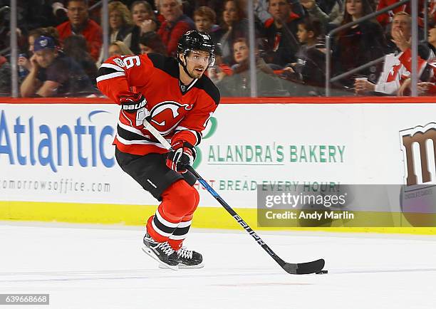 Jacob Josefson of the New Jersey Devils plays the puck during the game against the Montreal Canadiens at Prudential Center on January 20, 2017 in...