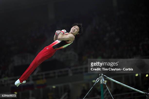 Gymnastics - Olympics: Day 5 Kohei Uchimura of in action during his routine on the Horizontal Bar during the Artistic Gymnastics Men's Individual...