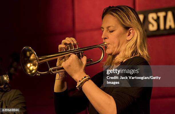 American Jazz musician Ingrid Jensen plays trimpet as she performs with the Madera Latino Project at the Jazz Standard, New York, New York, January...