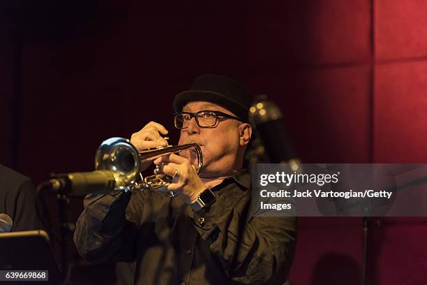 American Jazz musician Brian Lynch plays trumpet as he leads his band, the Madera Latino Project, at the Jazz Standard, New York, New York, January...