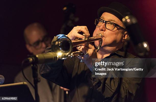 American jazz trumpeter Brian Lynch leads his Madera Latino band with Ruben Rodriguez on upright acoustic bass in a tribute to the music of Woody...