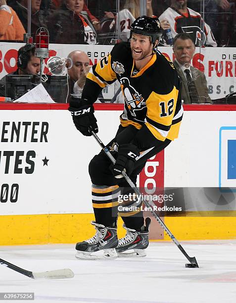 Ryan Malone of the Pittsburgh Penguins Alumni skates the puck against the Philadelphia Flyers Alumni on January 14, 2017 at the Wells Fargo Center in...