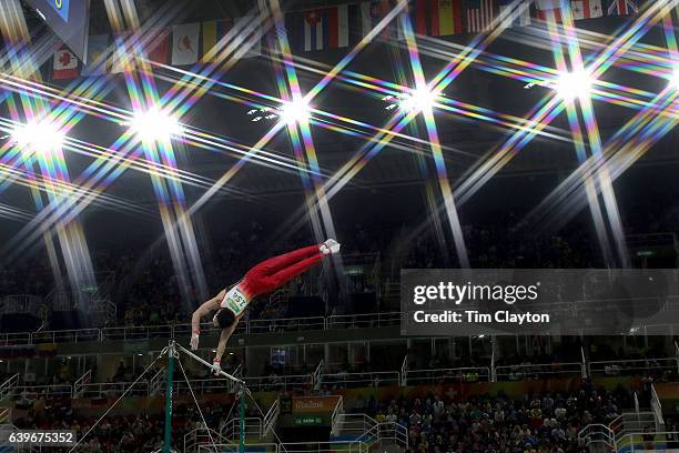 Gymnastics - Olympics: Day 5 Kohei Uchimura of in action during his routine on the Horizontal Bar during the Artistic Gymnastics Men's Individual...