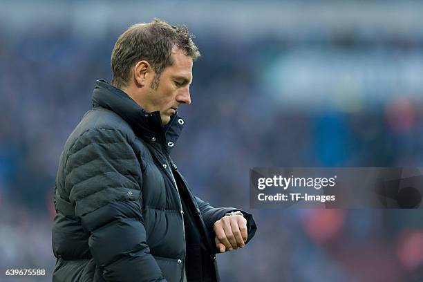 Head couch Markus Weinzierl of Schalke looks on to the clock during the Bundesliga match between FC Schalke 04 and FC Ingolstadt 04 at Veltins-Arena...