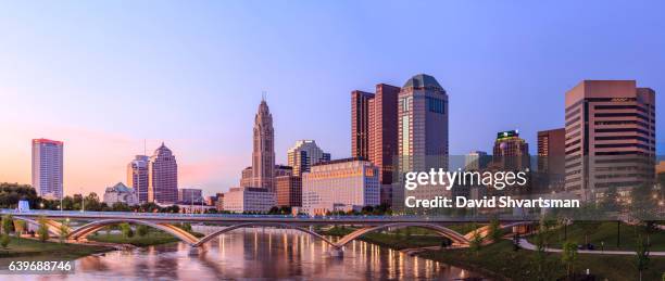 downtown columbus reflection in the river at the blue hour, ohio, usa - columbus ohio ストックフォトと画像