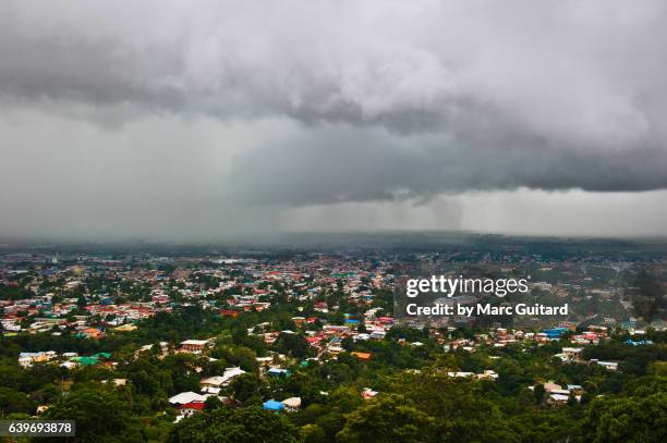 menacing storm over trinidad, trinidad & tobago - port of spain stock pictures, royalty-free photos & images