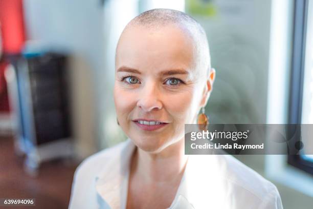 portrait of a beautiful woman with shaved head - cancer portrait stock-fotos und bilder