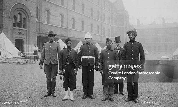 Group of soldiers from various British colonial regiments at Chelsea Barracks in London prior to Queen Victoria's Diamond Jubilee celebrations, June...