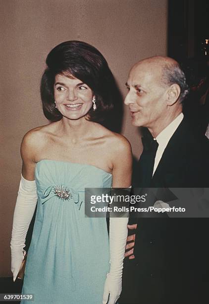 Former First Lady of the United States, Jacqueline Kennedy pictured with Rudolf Bing , General Manager of the Metropolitan Opera, at the Met Theatre...