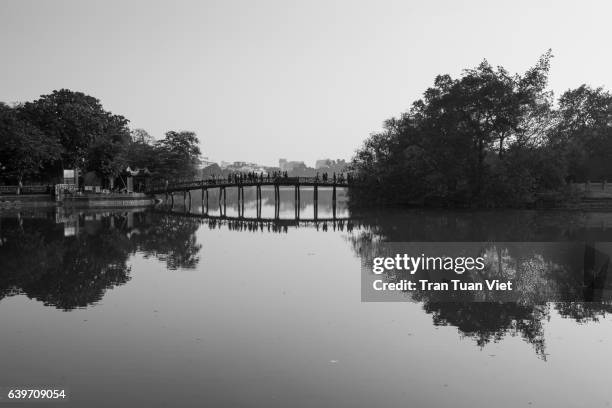 the huc bridge, black and white, reflection, hanoi - huc bridge stock pictures, royalty-free photos & images