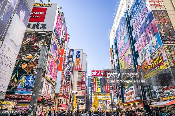 crowded streets of akihabara - street shopping stockfoto's en -beelden