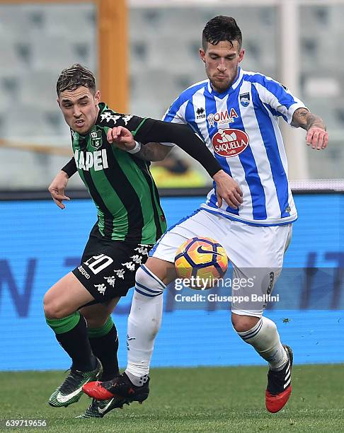 Pol Lirola of US Sassuolo and Cristiano Biraghi of Pescara Calcio in action during the Serie A match between Pescara Calcio and US Sassuolo at...