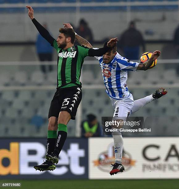 Domenico Berardi of US Sassuolo and Cristiano Biraghi of Pescara Calcio in action during the Serie A match between Pescara Calcio and US Sassuolo at...