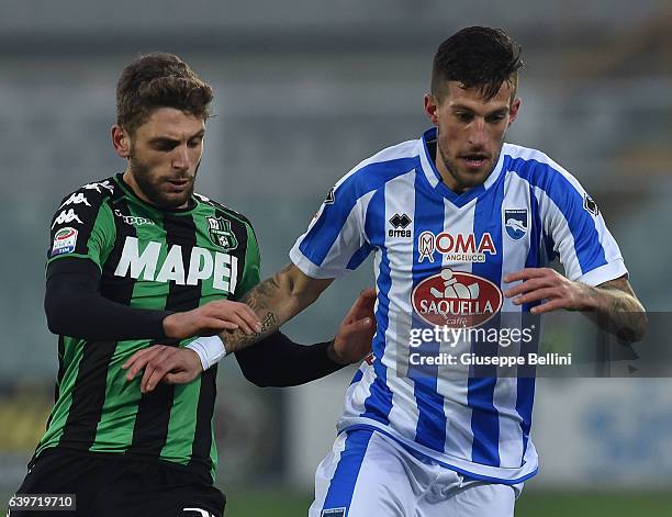 Domenico Berardi of US Sassuolo and Cristiano Biraghi of Pescara Calcio in action during the Serie A match between Pescara Calcio and US Sassuolo at...