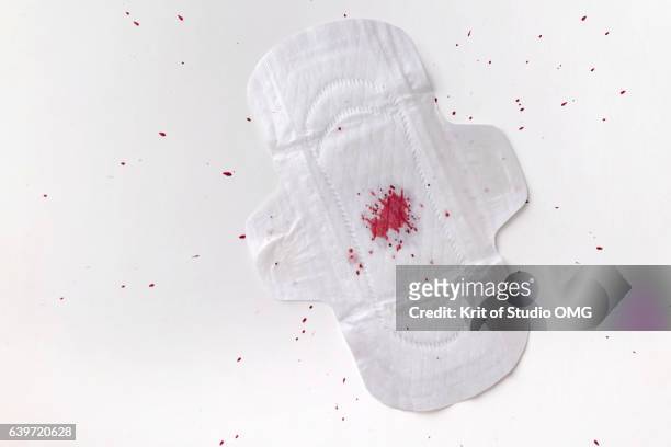 sanitary pad with menstruation - period blood foto e immagini stock