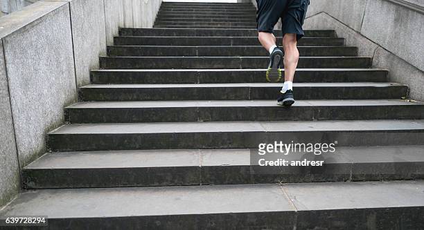 man running outdoors - beautiful male feet stock pictures, royalty-free photos & images