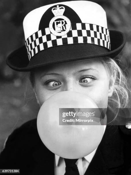 Picture from a series of humurous novelty images taken by Sunday People photographer Dennis Hutchinson. - Special constable Elaine Balbach went to...