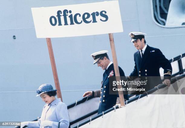 Queen Elizabeth II, Prince Philip the Duke of Edinburgh and Prince Andrew disembark HMS Invincible at Portsmouth as the ship returns from service in...