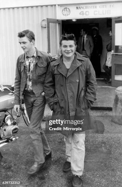 Antony Doab and his son Paul leave the Moss Side Inquiry at Manchester City Social Club, 18th August 1981. Mr Doab alleges that he was "jumped on" by...