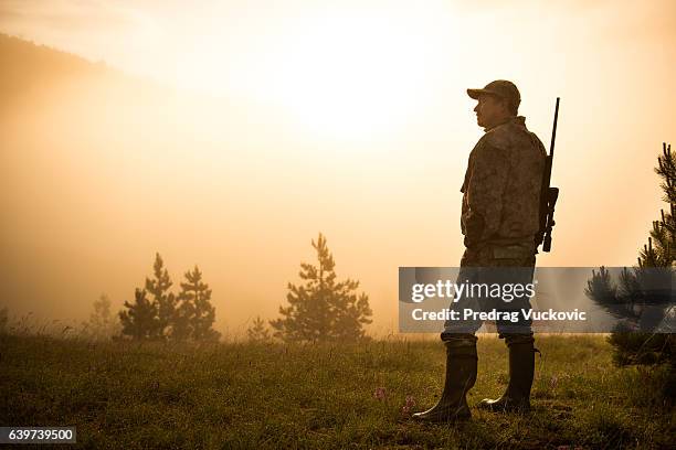 hunter in the nature - hunter stock pictures, royalty-free photos & images