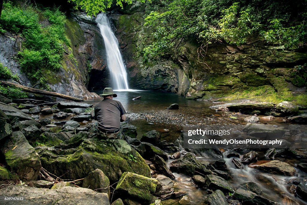 Enjoying a waterfall