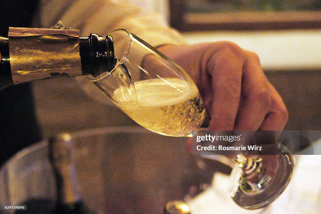 Pouring Champagne into flute