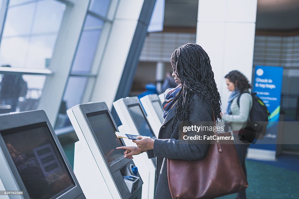 Gorgeous ethnic young adult female traveling in the airport