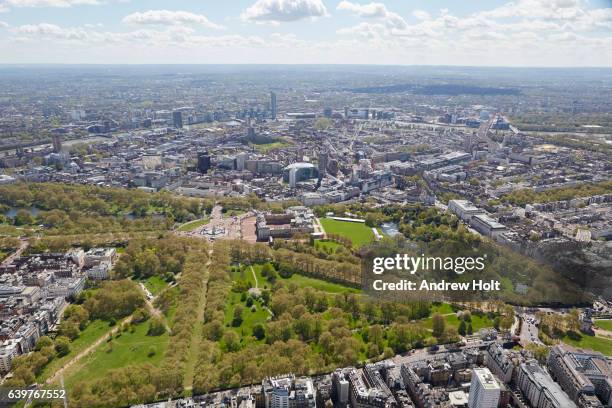 aerial photography view east-south of westminster and buckingham palace. london sw1 uk. - buckingham palace aerial stock pictures, royalty-free photos & images