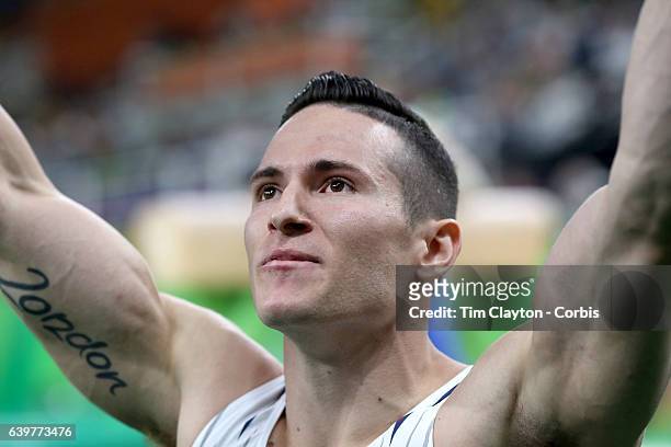 Gymnastics - Olympics: Day 9 Alexander Naddour of the United States celebrates after performing his routine in the Men's Pommel Horse Final which won...