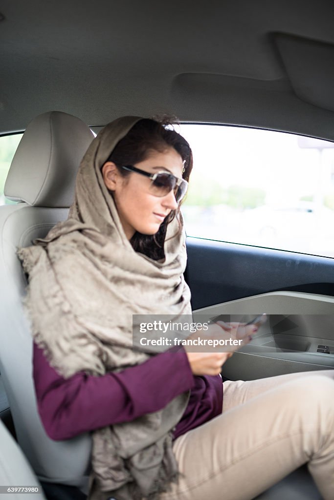 Woman driving the car in abu dhabi