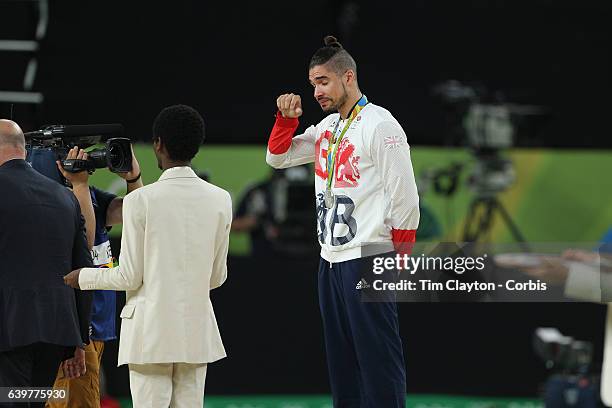 Gymnastics - Olympics: Day 9 Louis Smith of Great Britain, in tears on the podium after winning the silver medal in the Men's Pommel Horse Final with...