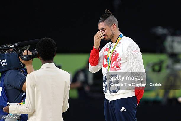 Gymnastics - Olympics: Day 9 Louis Smith of Great Britain, in tears on the podium after winning the silver medal in the Men's Pommel Horse Final with...