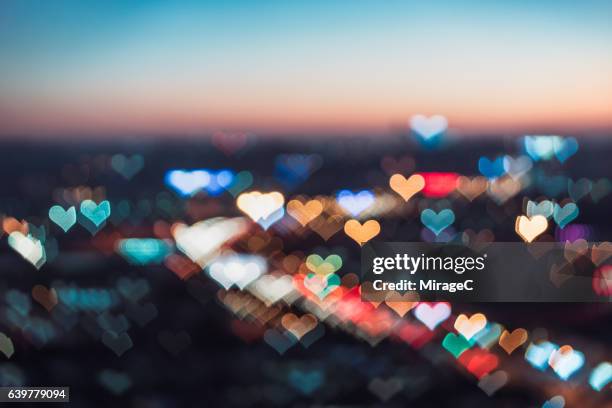 love bokeh of cityscape - bokeh love stock pictures, royalty-free photos & images