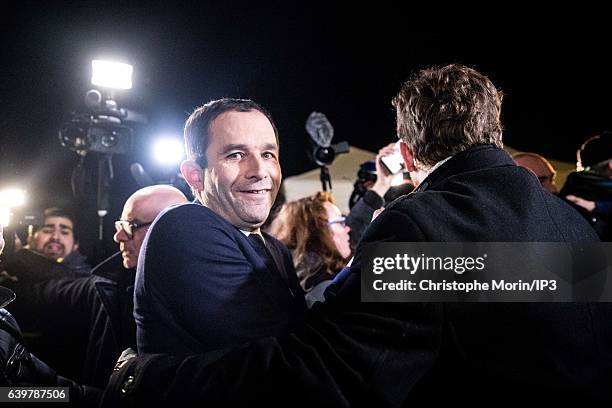 Candidate for the 2017 French Presidential Election Benoit Hamon celebrates his victory with his supporters after the announcement of the results of...