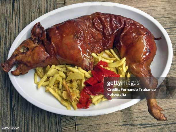 roasted pig with chips and peppers - cholesterol test stock pictures, royalty-free photos & images