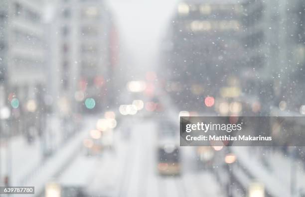 berlin modern bokeh winter city skyline with traffic and lights - matthias winter stock pictures, royalty-free photos & images
