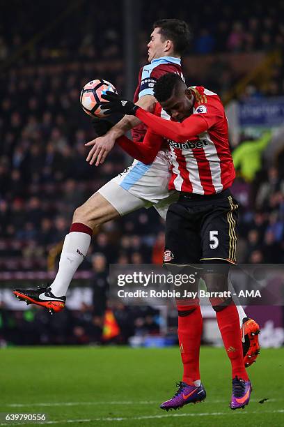 Michael Keane of Burnley and Papy Djilobodji of Sunderland during The Emirates FA Cup Third Round Replay between Burnley and Sunderland at Turf Moor...