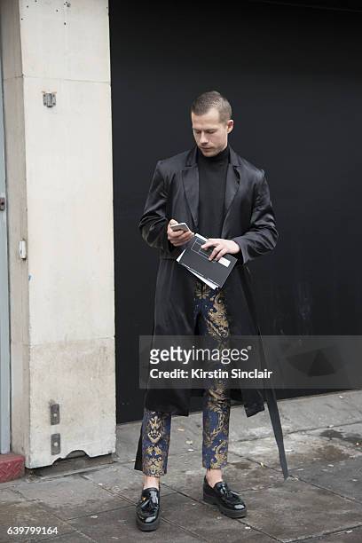 Painter Gregory Emvy wears Numero 21 shoes, Sorry I'm not sorry jacket and trousers day 3 of London Mens Fashion Week Autumn/Winter 2017, on January...