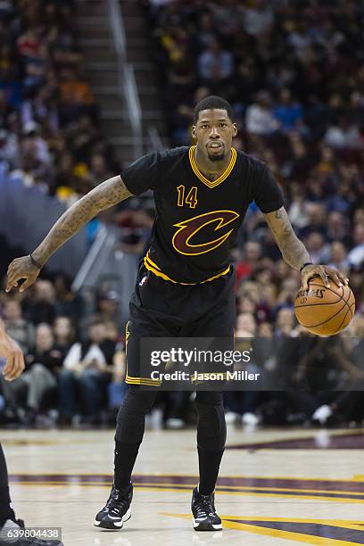 DeAndre Liggins of the Cleveland Cavaliers drives during the first half against the San Antonio Spurs at Quicken Loans Arena on January 21, 2017 in...