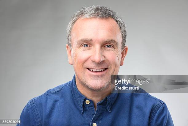 happy man - gray shirt stock pictures, royalty-free photos & images