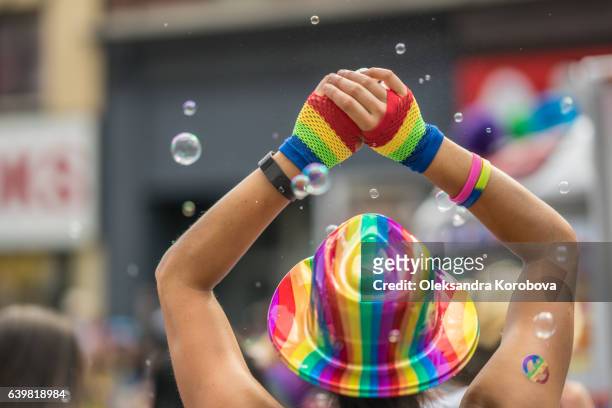 young brunette woman promoting marriage equality. - pride parade stock pictures, royalty-free photos & images