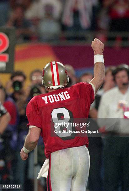 Steve Young of the San Francisco 49ers celebrates after they scored a touchdown against the San Diego Chargers during Super Bowl XXIX on January 29,...