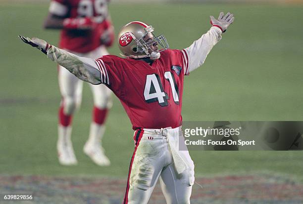 Toi Cook of the San Francisco 49ers celebrates against the San Diego Chargers during Super Bowl XXIX on January 29, 1995 at Joe Robbie Stadium in...