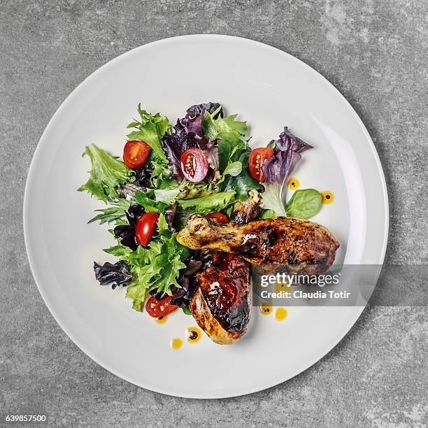 roasted chicken with fresh salad - paleo diet stock pictures, royalty-free photos & images