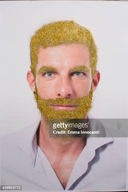 young man with golf hair and beard - camicia di paillette foto e immagini stock