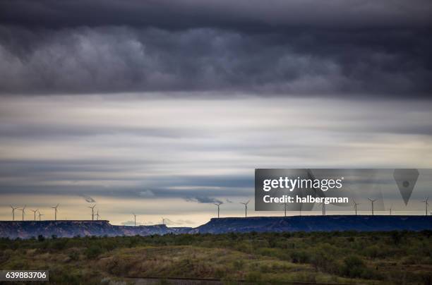 stormy sky and wind turbines over west texas plain - lubbock texas stock pictures, royalty-free photos & images