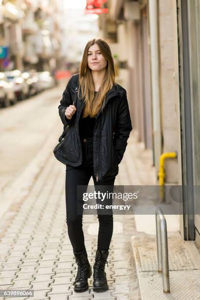 cute young woman - white boot stock pictures, royalty-free photos & images