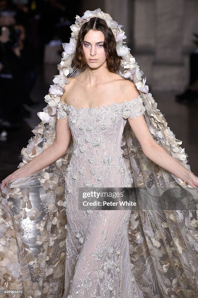 Nicole Langes walks the runway during the Georges Hobeika Spring