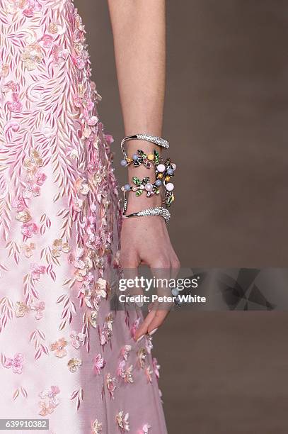 Model, jewel detail, walks the runway during the Georges Hobeika Spring Summer 2017 show as part of Paris Fashion Week on January 23, 2017 in Paris,...